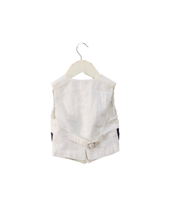 A White Vests from Nicholas & Bears in size 6-12M for boy. (Back View)