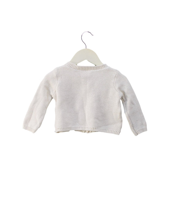 A Ivory Cardigans from Natalys in size 6-12M for girl. (Back View)