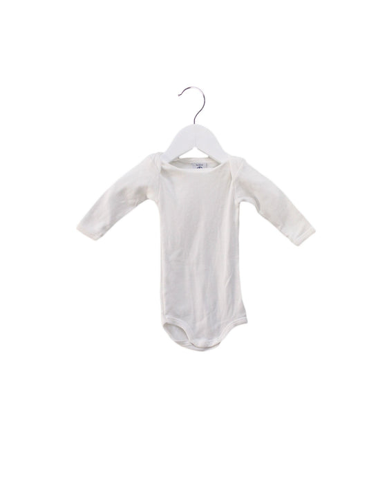 A White Long Sleeve Bodysuits from Petit Bateau in size 0-3M for girl. (Front View)