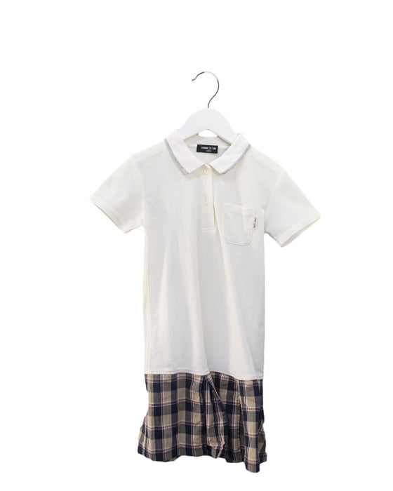 A Ivory Short Sleeve Dresses from Comme Ca Ism in size 5T for girl. (Front View)