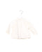 A Ivory Long Sleeve Tops from Bonpoint in size 6-12M for girl. (Front View)