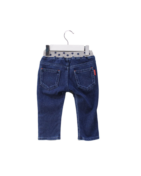 A Blue Jeans from Miki House in size 12-18M for girl. (Back View)