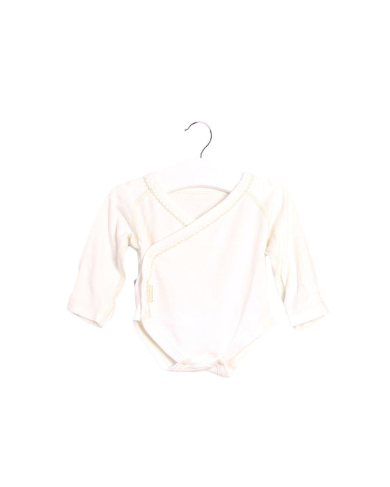 A Ivory Long Sleeve Bodysuits from Natures Purest in size 0-3M for girl. (Front View)