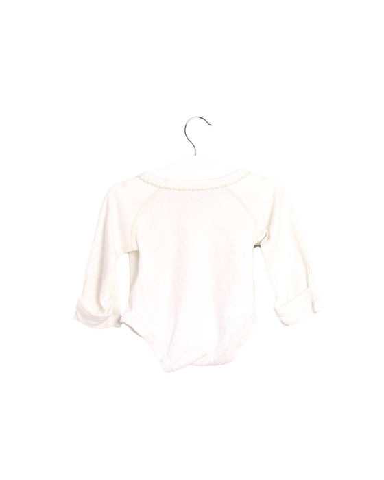 A Ivory Long Sleeve Bodysuits from Natures Purest in size 0-3M for girl. (Back View)