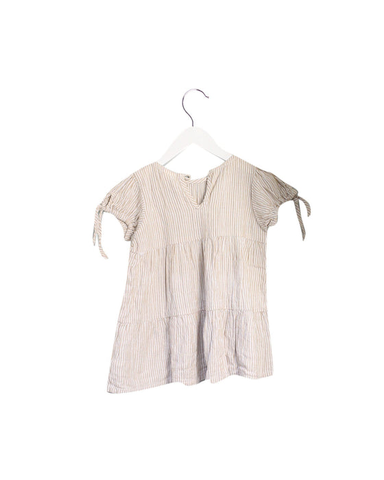 A Beige Short Sleeve Dresses from Seed in size 12-18M for girl. (Back View)