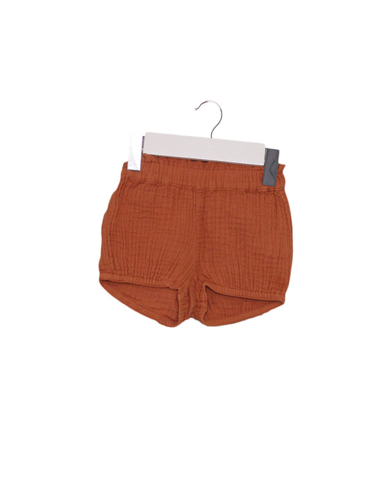 A Orange Shorts from Seed in size 3-6M for girl. (Front View)