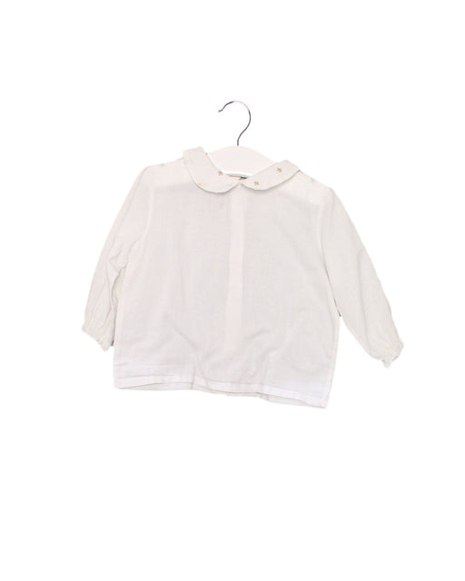 A White Long Sleeve Tops from Bebe Organic in size 6-12M for girl. (Front View)
