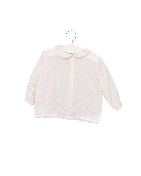 A White Long Sleeve Tops from Bebe Organic in size 6-12M for girl. (Front View)