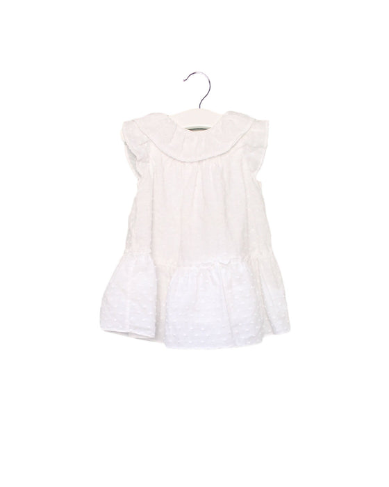 A White Short Sleeve Dresses from Nanos in size 6-12M for girl. (Front View)