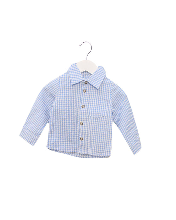 A Blue Shirts from Cotton Pigs in size 6-12M for boy. (Front View)