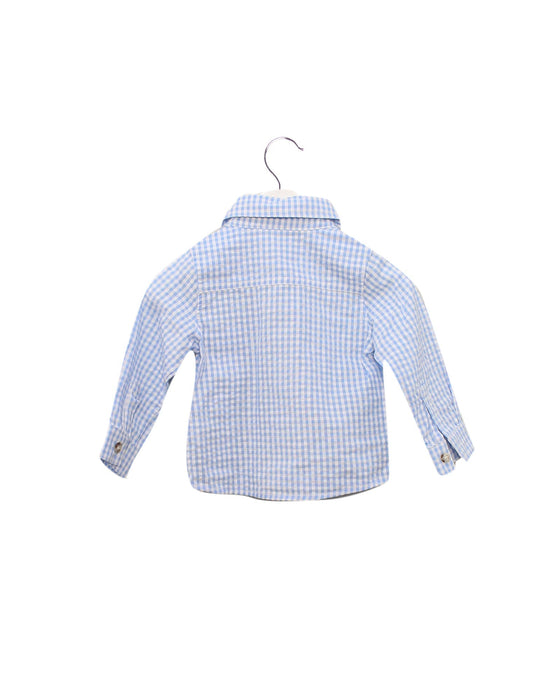 A Blue Shirts from Cotton Pigs in size 6-12M for boy. (Back View)