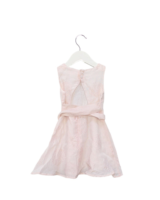 A Pink Sleeveless Dresses from Seed in size 2T for girl. (Back View)