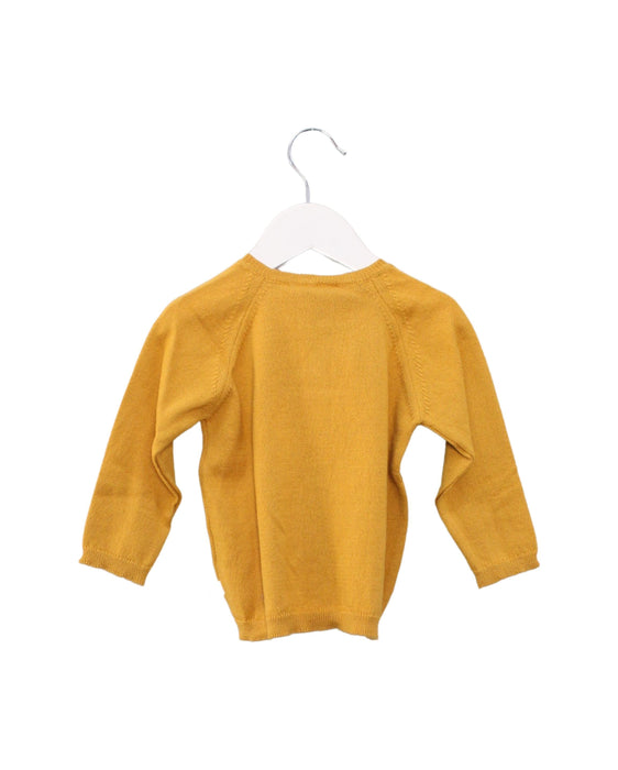A Yellow Cardigans from Les Enfantines in size 6-12M for neutral. (Back View)