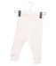 A Ivory Sweatpants from Bonpoint in size 3-6M for girl. (Front View)