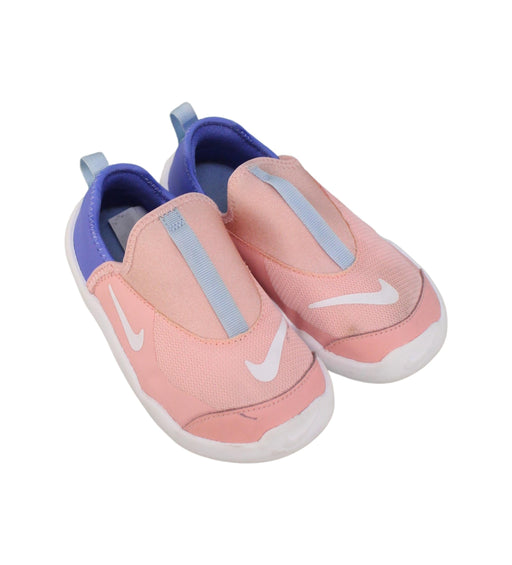 A Pink Slip Ons from Nike in size 4T for girl. (Front View)