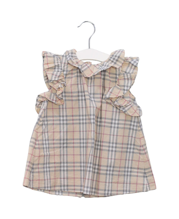 A Brown Sleeveless Dresses from Burberry in size 6-12M for girl. (Front View)