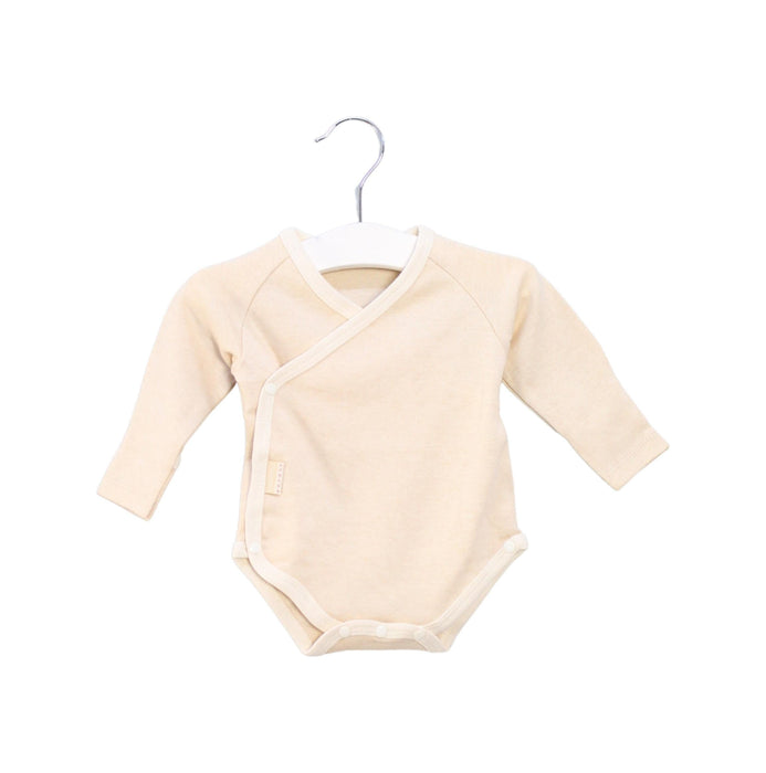 A Beige Long Sleeve Bodysuits from Natures Purest in size 0-3M for girl. (Front View)
