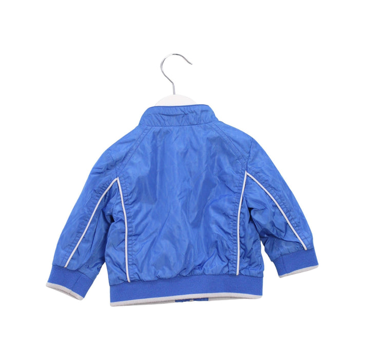 A Blue Lightweight Jackets from Armani in size 3-6M for boy. (Back View)