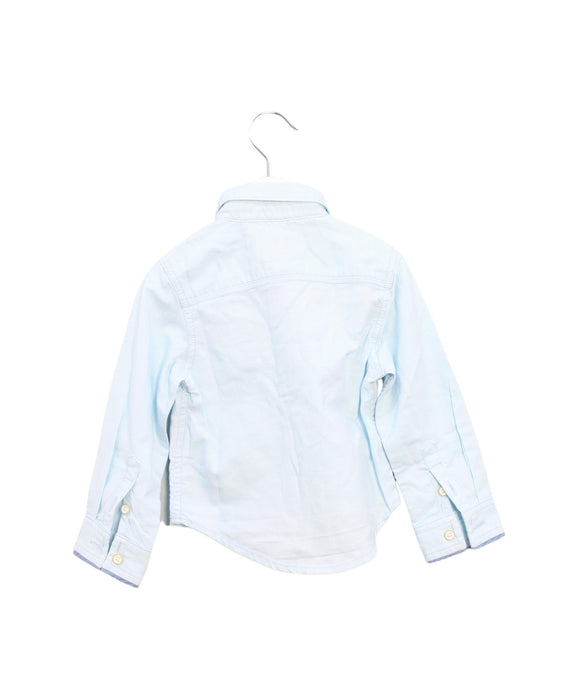 A Blue Shirts from Gingersnaps in size 3-6M for boy. (Back View)