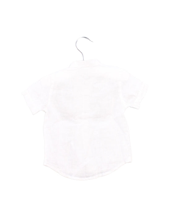 A White Shirts from Chickeeduck in size 6-12M for boy. (Back View)