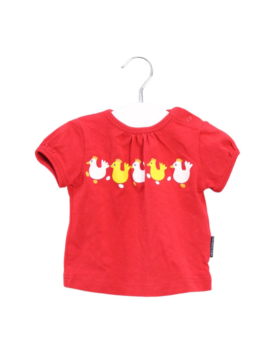 A Red Short Sleeve T Shirts from Polarn O. Pyret in size 0-3M for girl. (Front View)