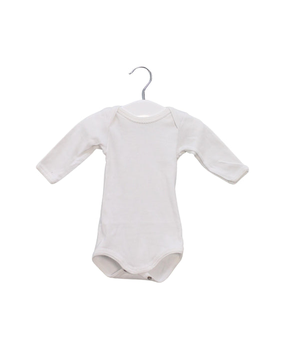 A White Long Sleeve Bodysuits from Petit Bateau in size 0-3M for girl. (Front View)