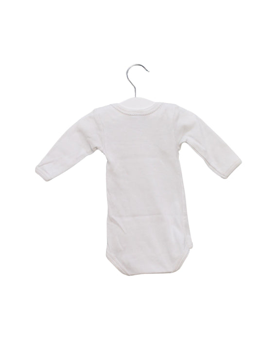 A White Long Sleeve Bodysuits from Petit Bateau in size 0-3M for girl. (Back View)