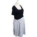 A Black Short Sleeve Dresses from Seraphine in size S for maternity. (Front View)