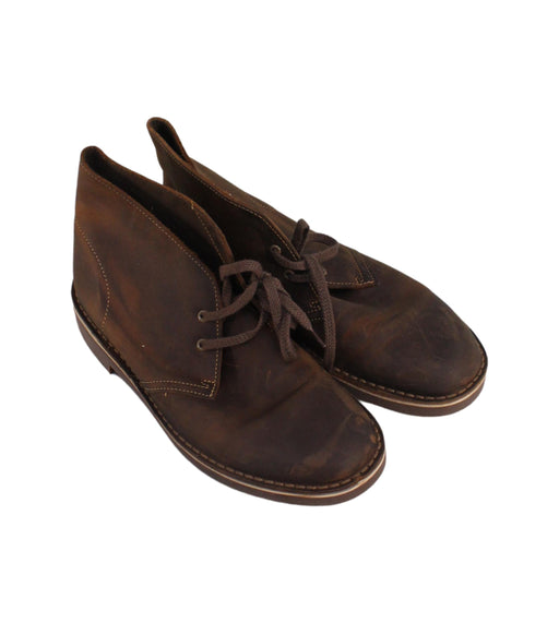A Brown Casual Boots from Clarks in size 14Y for boy. (Front View)