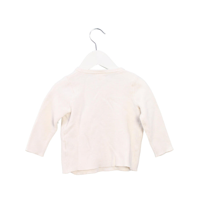 A White Cardigans from Seed in size 6-12M for girl. (Back View)