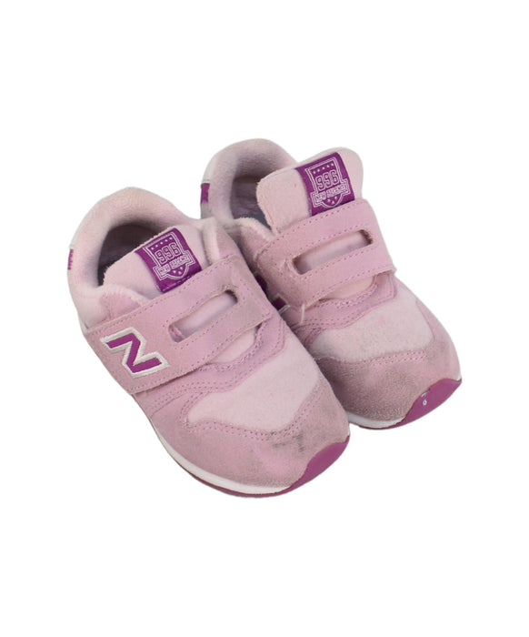 A Pink Sneakers from Nike in size 4T for girl. (Front View)
