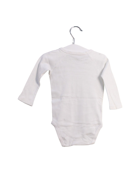 A White Long Sleeve Bodysuits from Petit Bateau in size 3-6M for girl. (Back View)
