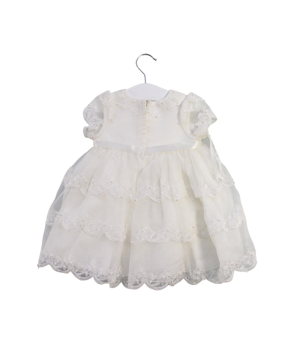 A White Short Sleeve Dresses from Sarah Louise in size 0-3M for girl. (Back View)