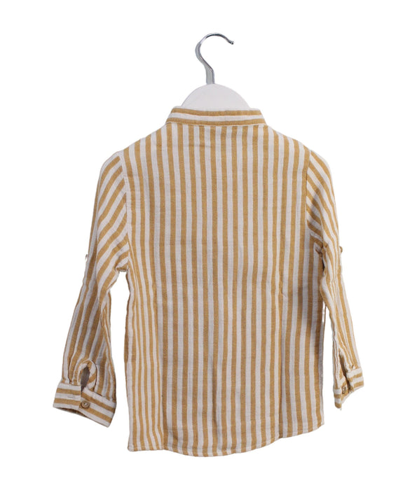 A Yellow Shirts from Paz Rodriguez in size 4T for boy. (Back View)