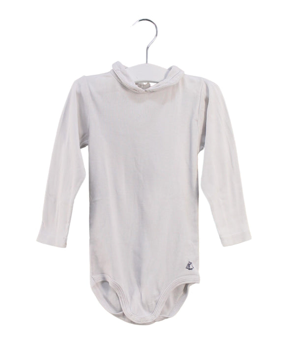A White Long Sleeve Bodysuits from Petit Bateau in size 18-24M for girl. (Front View)