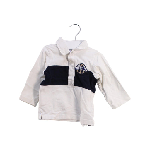 A White Long Sleeve Polos from Jacadi in size 6-12M for boy. (Front View)