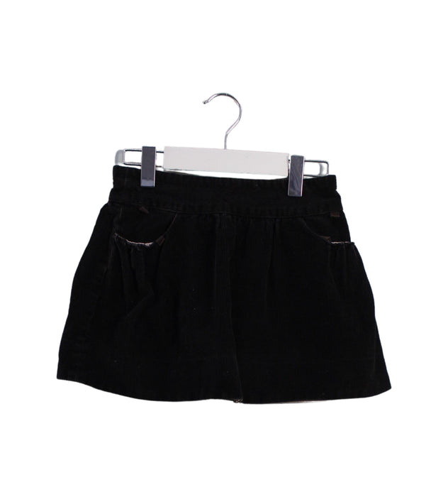 A Black Short Skirts from Bonpoint in size 4T for girl. (Front View)