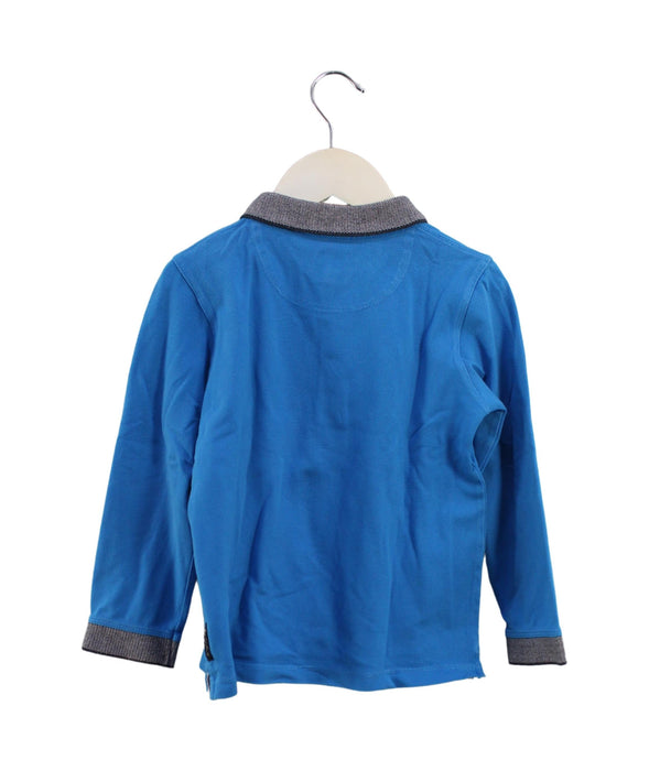 A Blue Long Sleeve Polos from Armani in size 4T for boy. (Back View)