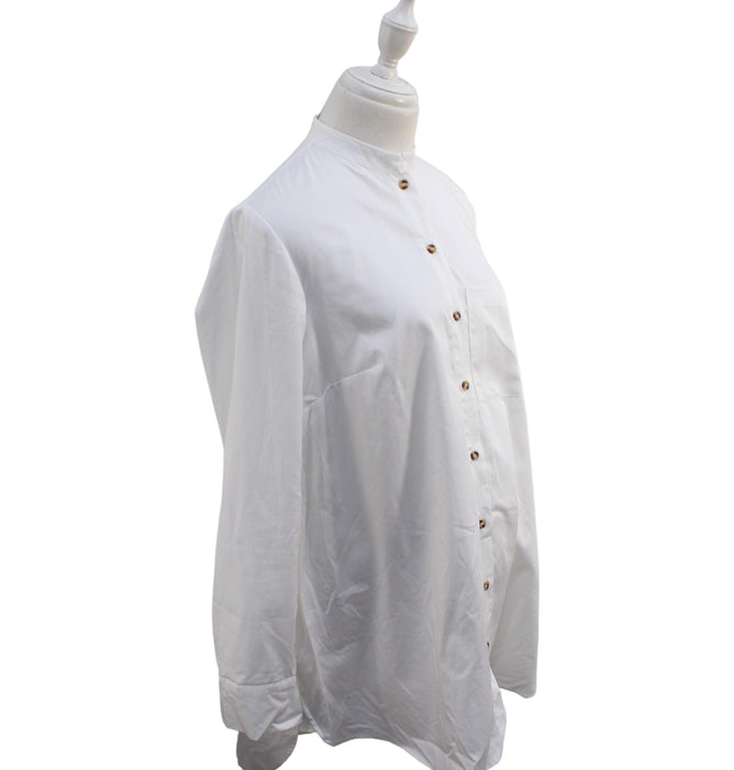 A White Shirts from Seraphine in size XS for maternity. (Front View)