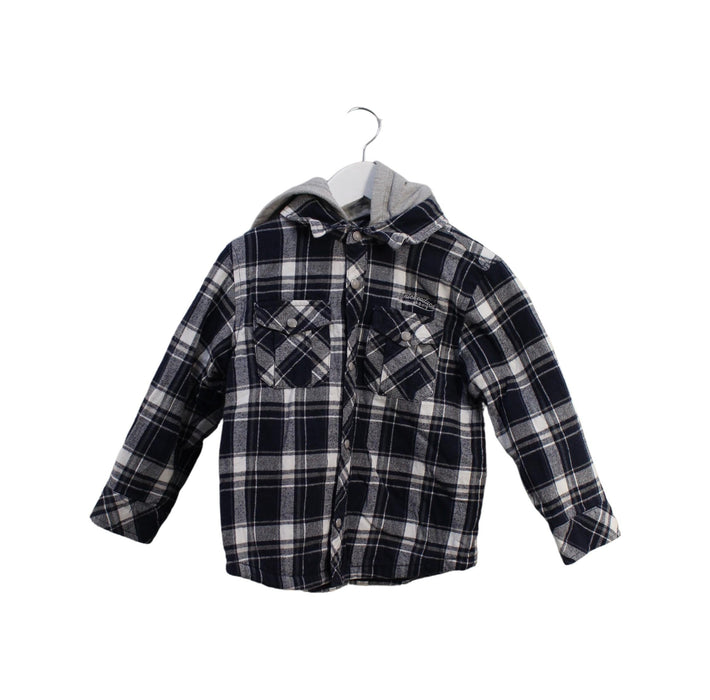 A Black Shirts from Chickeeduck in size 4T for boy. (Front View)