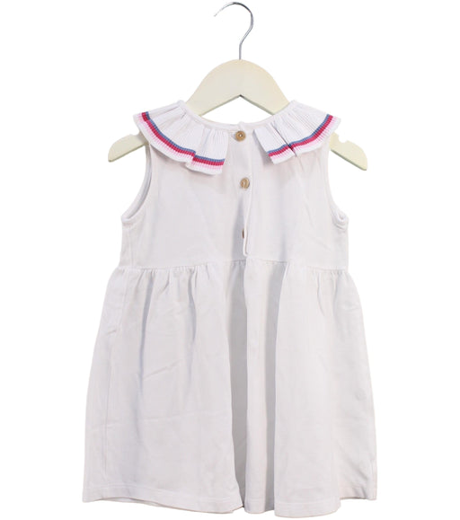 A White Sleeveless Dresses from Laranjinha in size 4T for girl. (Front View)