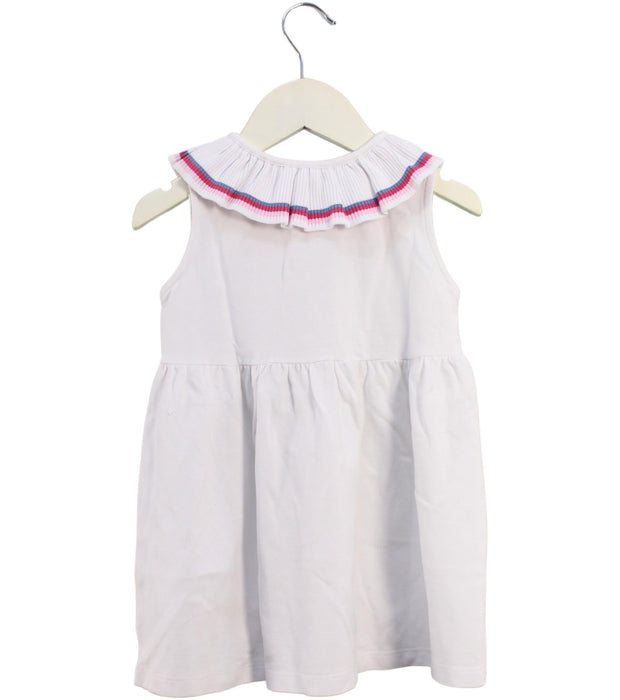 A White Sleeveless Dresses from Laranjinha in size 4T for girl. (Back View)