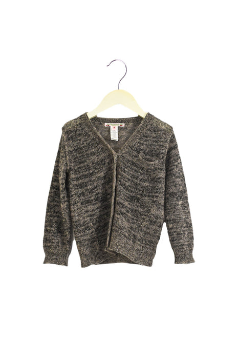 A Grey Cardigans from Bonpoint in size 4T for girl. (Front View)