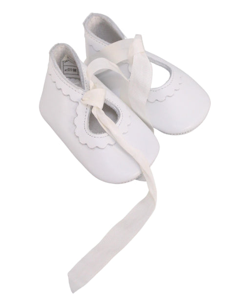 A White Flats from Jacadi in size 6-12M for girl. (Front View)