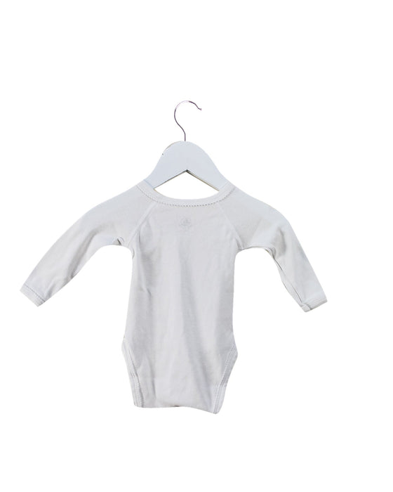 A White Long Sleeve Bodysuits from Petit Bateau in size 0-3M for neutral. (Back View)