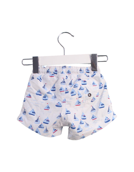 A White Swim Shorts from Sunuva in size 6-12M for boy. (Back View)