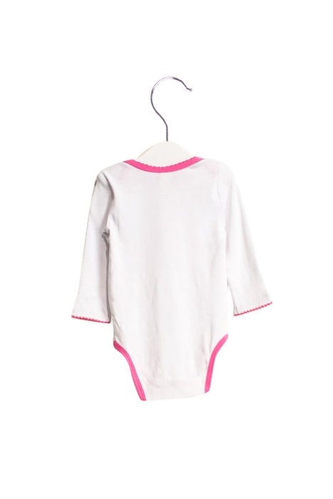 A White Long Sleeve Bodysuits from Diesel in size 3-6M for girl. (Back View)