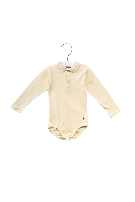 A White Long Sleeve Bodysuits from Petit Bateau in size 3T for girl. (Front View)