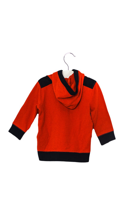 A Red Buttoned Sweatshirts from Tommy Hilfiger in size 6-12M for boy. (Back View)