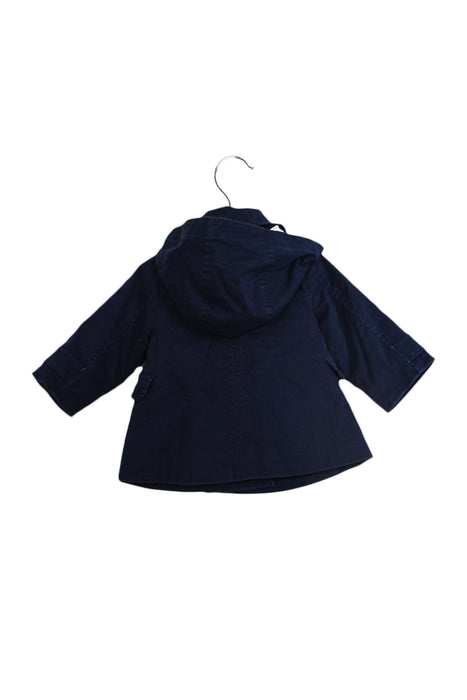 A Navy Lightweight Jackets from Jacadi in size 6-12M for girl. (Back View)